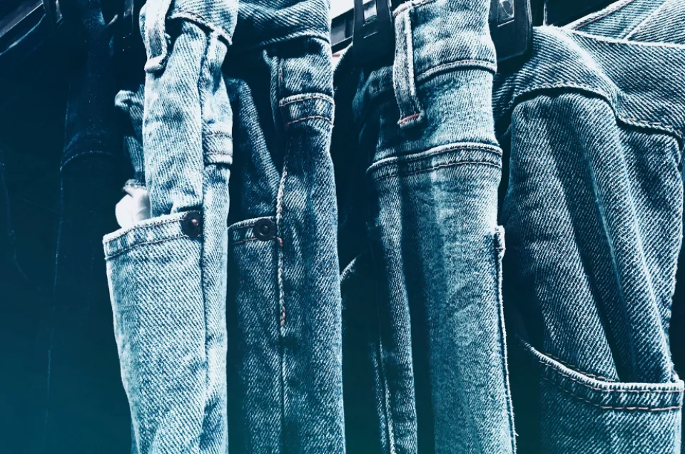 Jeans hanging side by side