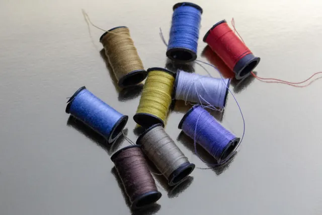 Thread spools on a table